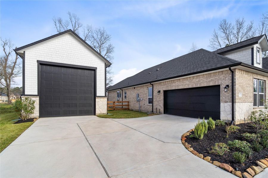 This home features a 2-car attached garage and an Oversized detached garage that can be used as an RV storage, and/or workshop. This home features a 2-car attached garage and an Oversized detached garage that can be used as an RV storage, and/or workshop.
