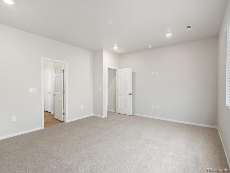 Spacious, unfurnished interior of a new home in Poudre Heights: The Alpine Collection, Windsor (Image 16).