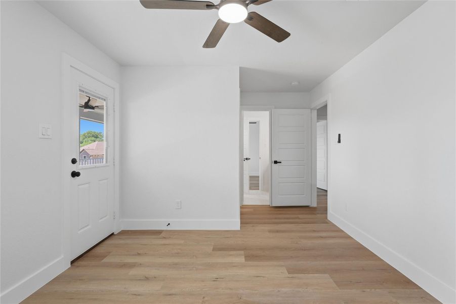 Secondary bedroom upstairs has an exterior door to the street facing balcony Secondary bedroom upstairs has an exterior door to the street facing balcony