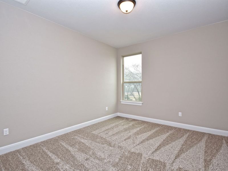Representative unfurnished interior of a home built from the Madera II by Giddens Homes in Scofield Farms Estates, Georgetown (Image 351).