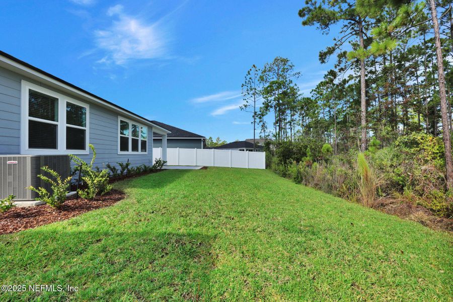 Exterior details and patio area of a home in Bradley Creek, Green Cove Springs (Image 26).