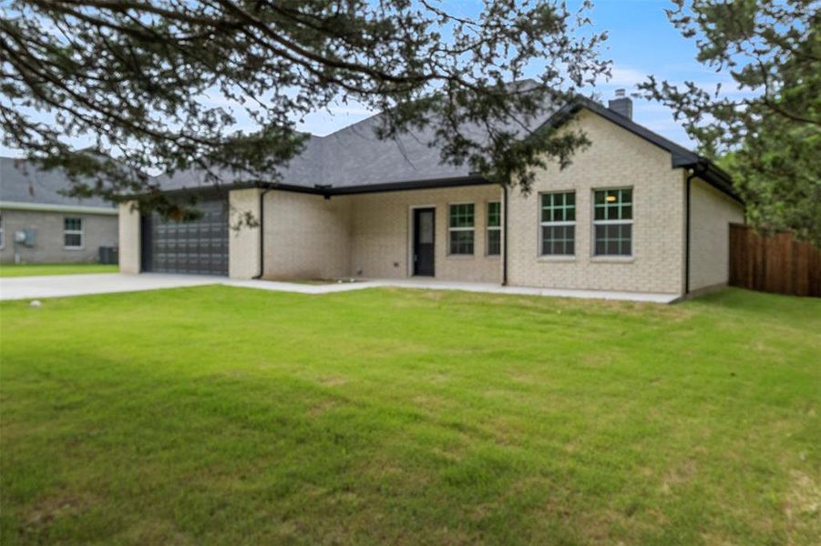 Exterior details and patio area of a home in , Ector (Image 3).