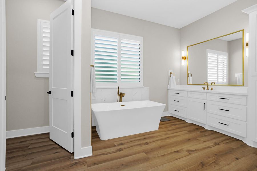 Spa-inspired primary bathroom with soaking tub