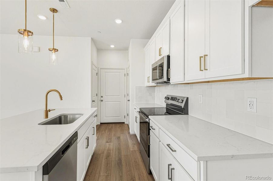 Furnished interior view inside a new home in Turnberry Villas, Commerce City (Image 14).
