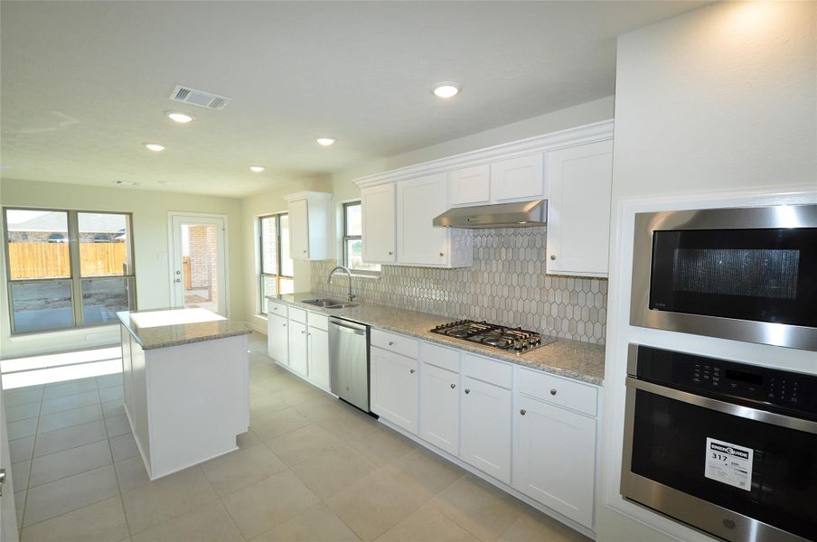 Furnished interior view inside a new home in , League City (Image 15).