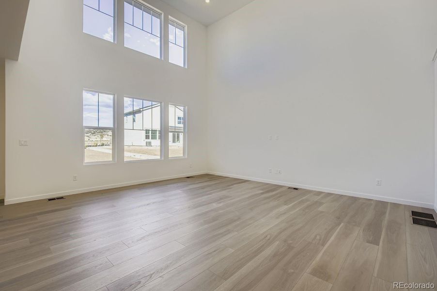 Spacious, unfurnished interior of a new home in Riano Ridge: The Monarch Collection, Loveland (Image 9).