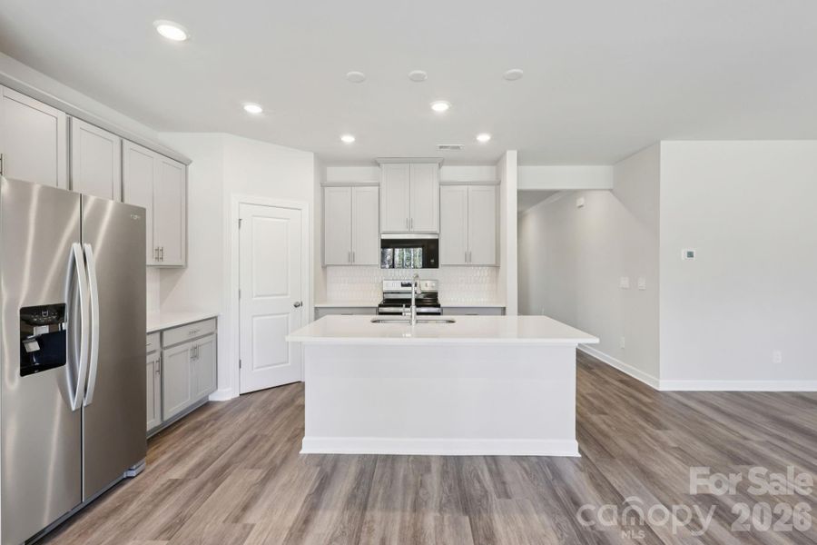 Furnished interior view inside a new home in Harper Landing, Stanley (Image 3).