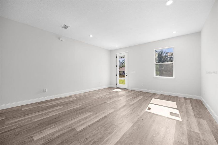 Spacious, unfurnished interior of a new home in , Port Charlotte (Image 15).