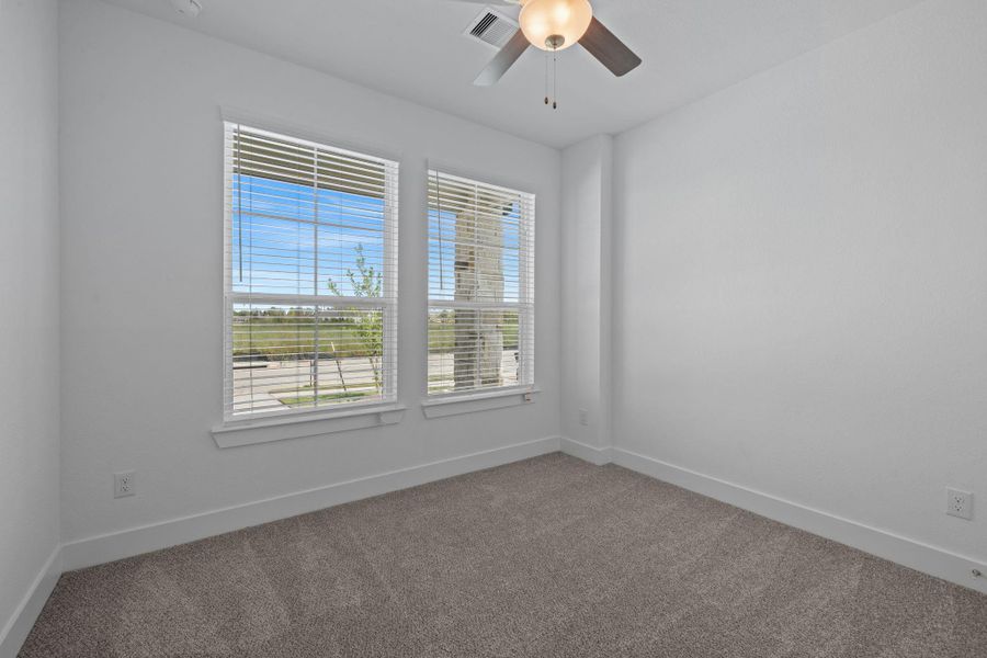 Spacious, unfurnished interior of a new home in Meridiana, Iowa Colony (Image 17).