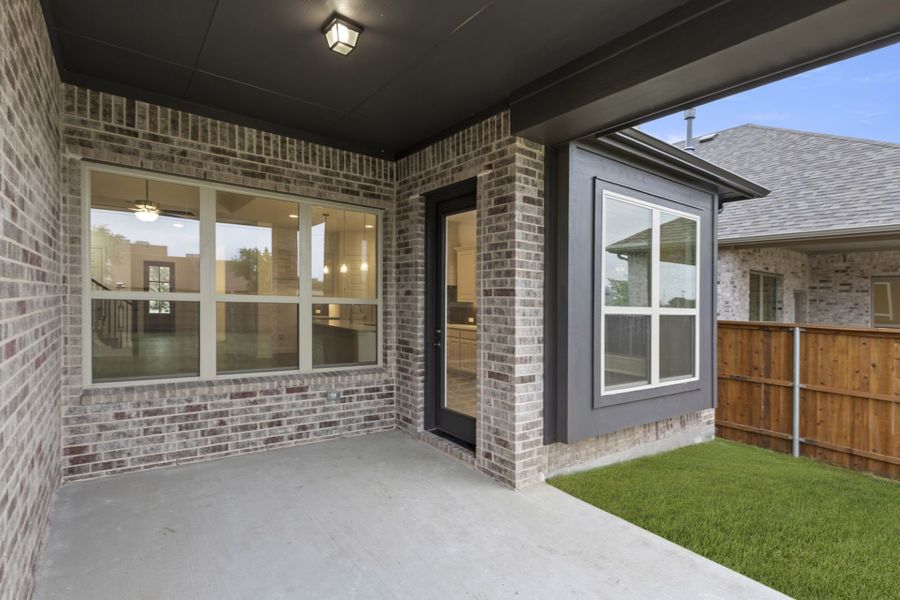 Exterior details and patio area of a home in River Ranch, Van Alstyne (Image 3).