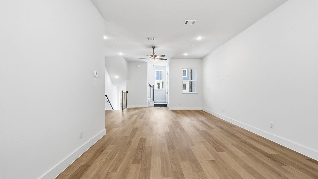 Furnished interior view inside a new home in Collin Creek, Plano (Image 25).