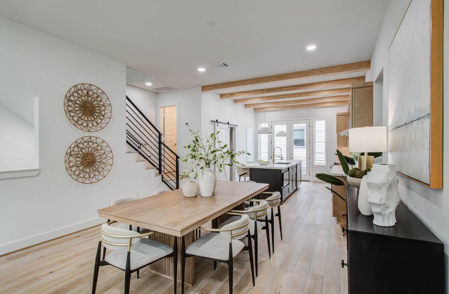 Large dining area nestled between the kitchen and living area. Makes entertaining easy and fun.