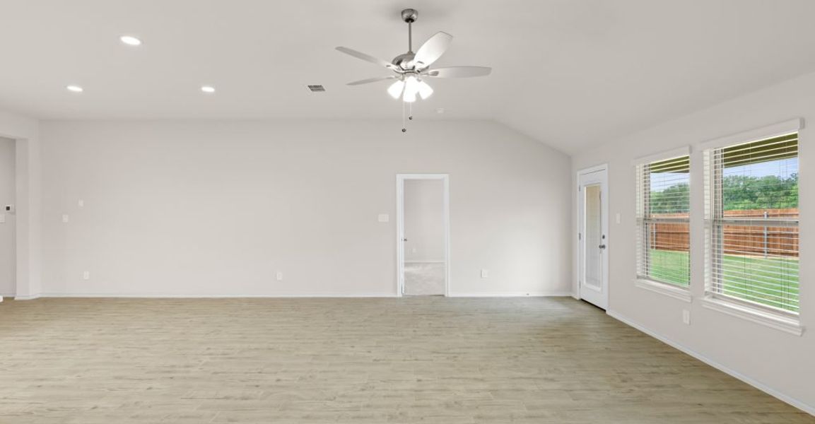 Representative exterior photo of a completed home built from the Austin by Impression Homes in Keeneland, Aubrey, TX (Image 10).