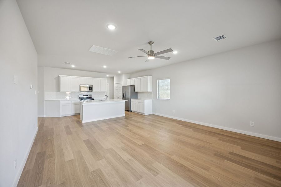 Living Room in the Oak II home plan by Trophy Signature Homes – REPRESENTATIVE PHOTO