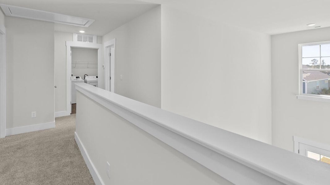 Spacious, unfurnished interior of a new home in Indigo Preserve, Leland (Image 27).