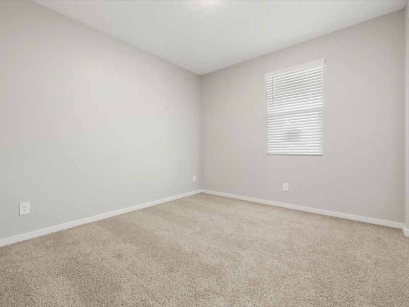Spacious, unfurnished interior of a new home in Blossom Rock Reserve Series, Apache Junction (Image 14).