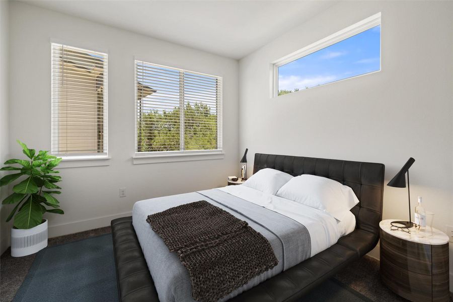 Carpeted bedroom with baseboards Carpeted bedroom with baseboards