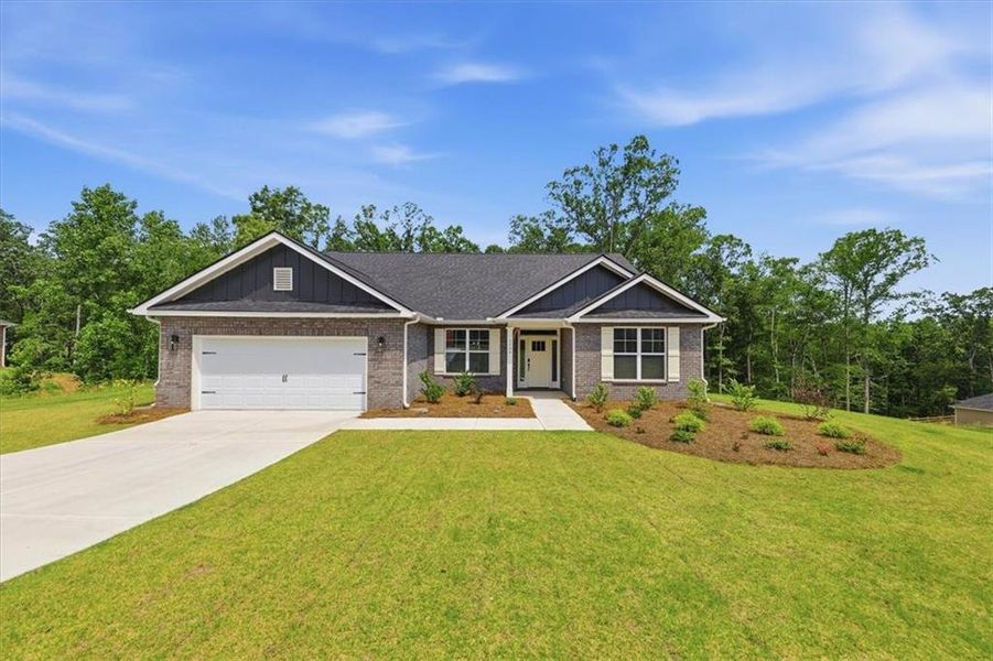 Front exterior of a new home in Tuscany Hills, Douglasville, GA, highlighting curb appeal (Image 1). Front exterior of a new home in Tuscany Hills, Douglasville, GA, highlighting curb appeal (Image 1).