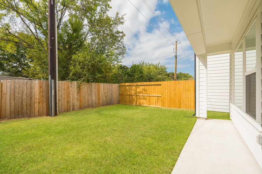 Exterior details and patio area of a home in , Houston (Image 3).