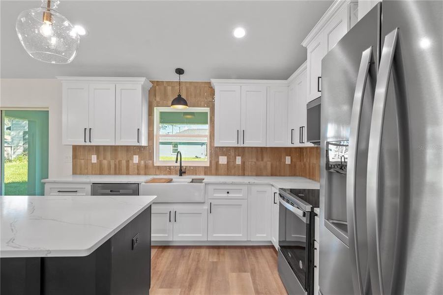 Furnished interior view inside a new home in , Dunnellon (Image 12).