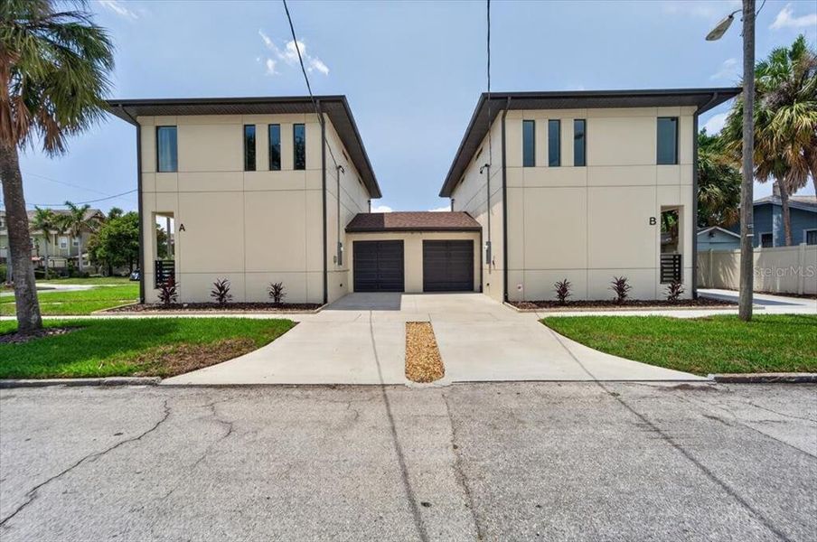 Front exterior of a new home in , Tampa, FL, highlighting curb appeal (Image 32).