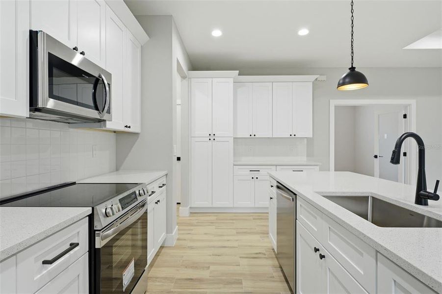 Furnished interior view inside a new home in , Port Charlotte (Image 11).