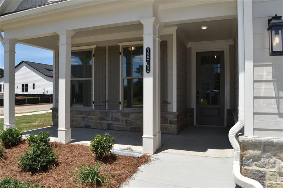 Exterior details and patio area of a home in Soleil Summit Chase, Snellville (Image 23).