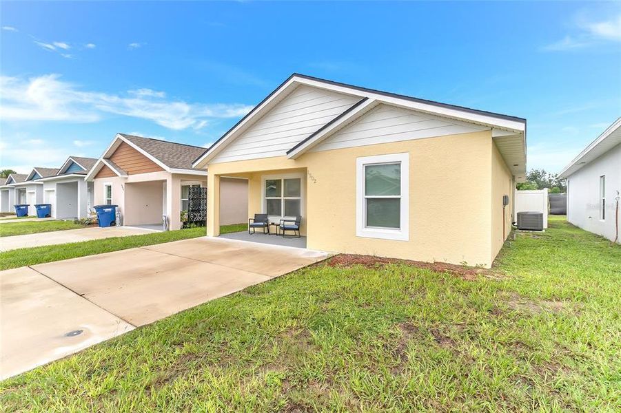 Exterior details and patio area of a home in , Sebring (Image 23).