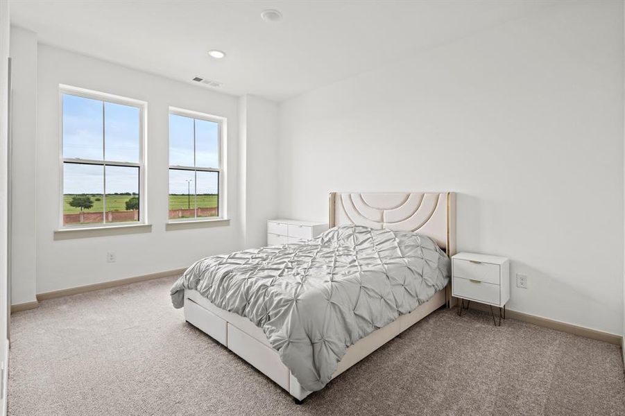 Bedroom featuring carpet floors and recessed lighting