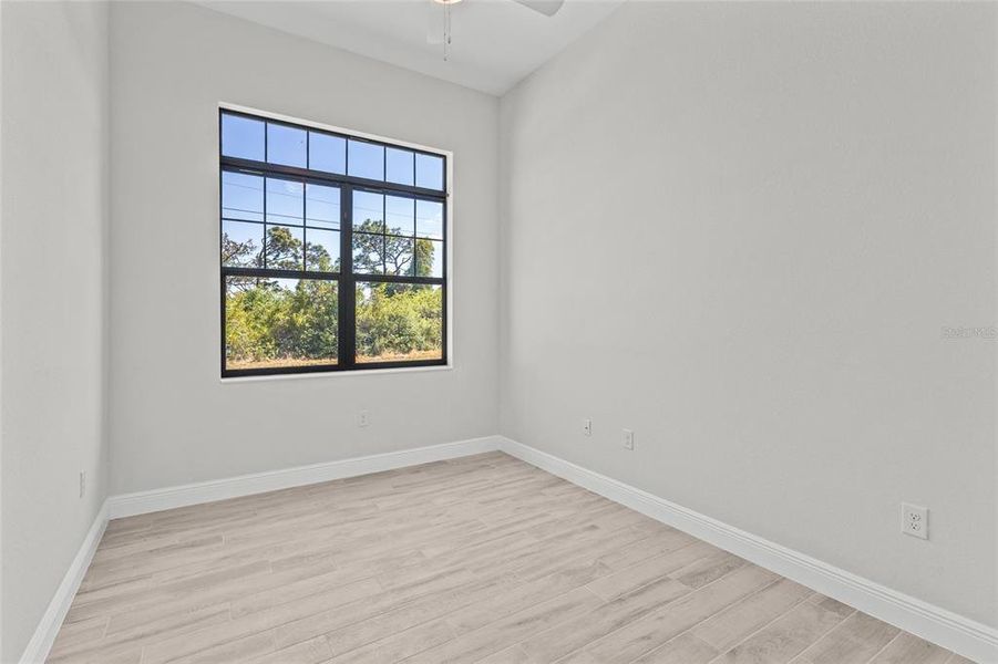 Spacious, unfurnished interior of a new home in , Port Charlotte (Image 18).