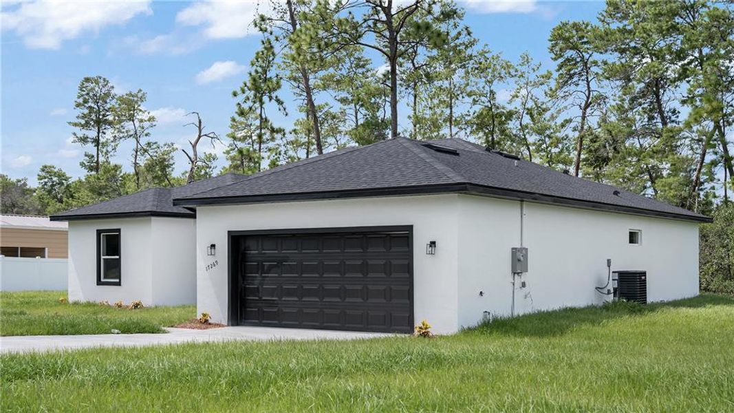 Front exterior of a new home in , Ocala, FL, highlighting curb appeal (Image 23).