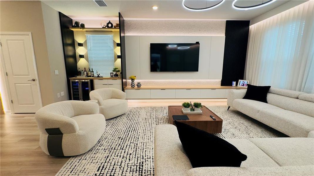 Furnished interior view inside a new home in Harvest at Ovation, Winter Garden (Image 7).
