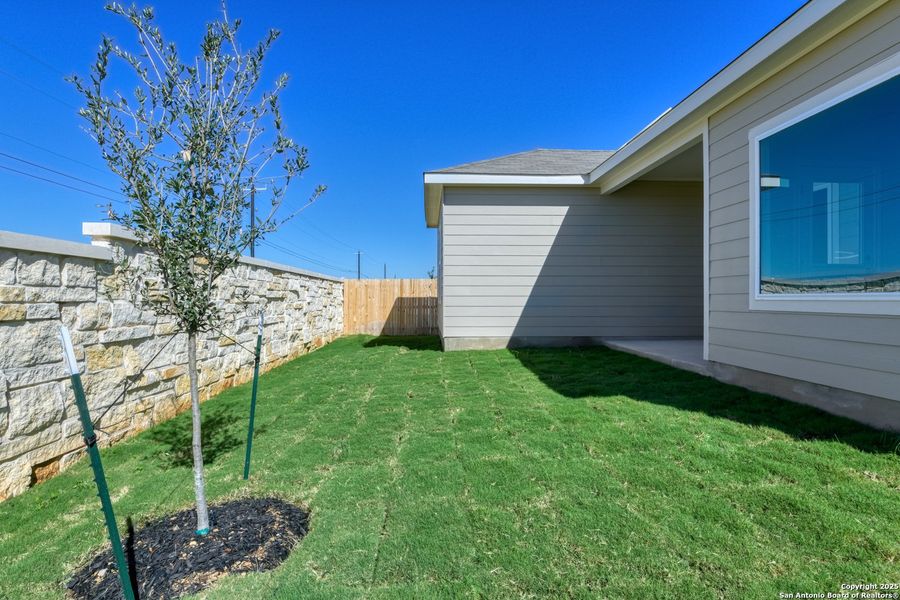 Exterior details and patio area of a home in Enclave at Hennersby Hollow 50's, San Antonio (Image 2). Exterior details and patio area of a home in Enclave at Hennersby Hollow 50's, San Antonio (Image 2).