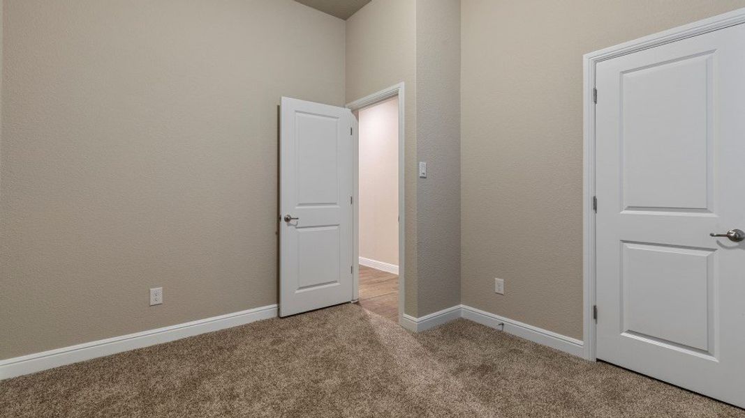 Representative unfurnished interior of a home built from the Guadalupe by D.R. Horton in Eden Ranch, Arlington (Image 37).