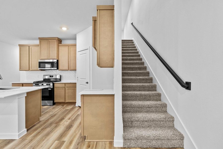 Furnished interior view inside a new home in Grand West, Houston (Image 7).