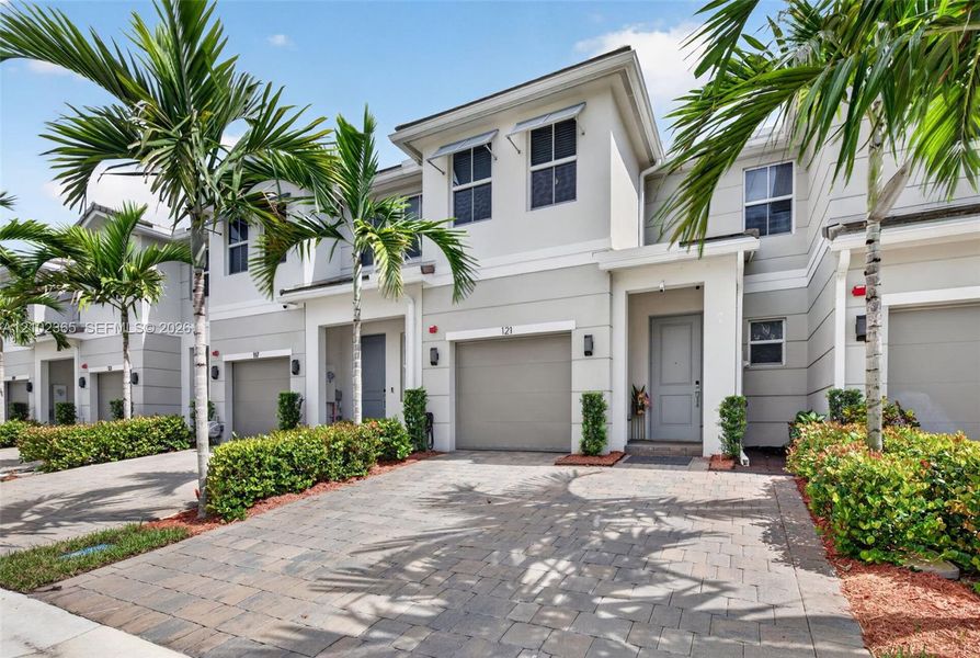 Front exterior of a new home in , Pembroke Pines, FL, highlighting curb appeal (Image 23).