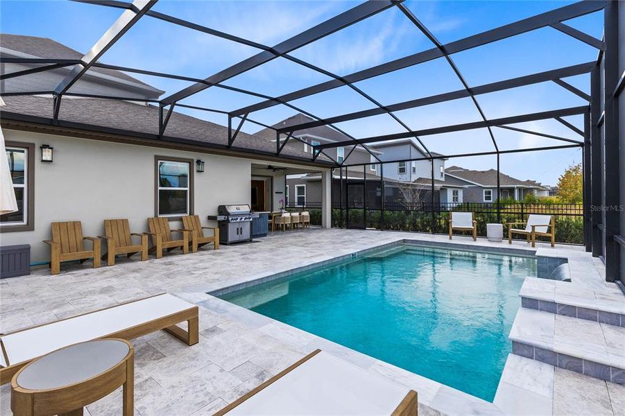 Exterior details and patio area of a home in Laureate Park, Orlando (Image 25).