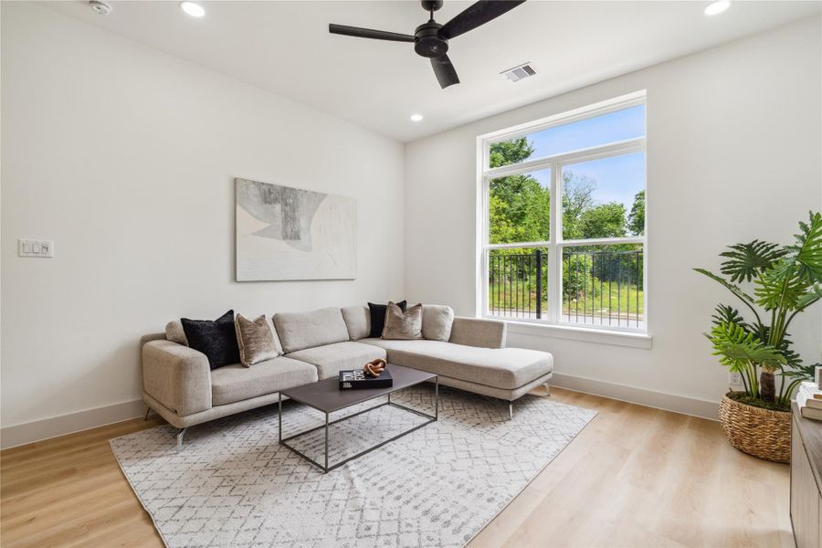 An ideal blend of comfort and clarity—this living space offers clean lines, natural light, and a peaceful view that invites you to unwind.