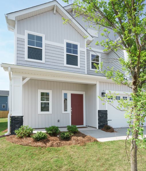 Representative exterior photo of a completed home built from the The Harrison by Cothran Homes in Holly Ridge, Greenville, SC (Image 29). Representative exterior photo of a completed home built from the The Harrison by Cothran Homes in Holly Ridge, Greenville, SC (Image 29).