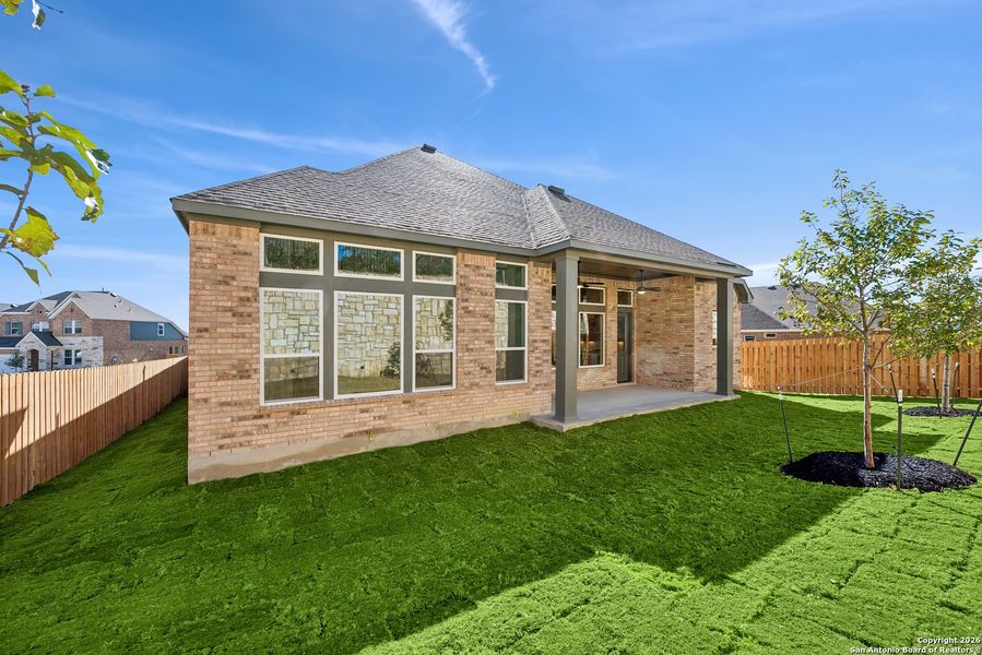 Exterior details and patio area of a home in Windsong - Legacy Series, Boerne (Image 4).