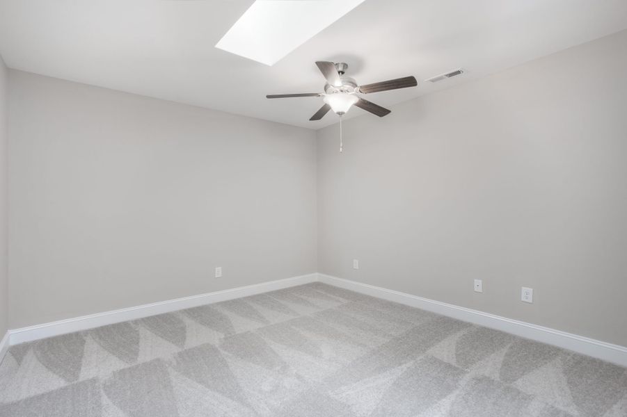 Representative unfurnished interior of a home built from the Kingston by Keystone Homes NC in Weybridge, Burlington (Image 18).
