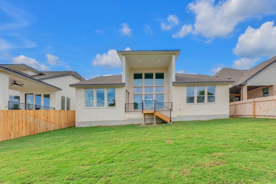 Exterior details and patio area of a home in Santa Rita Ranch - 60', Liberty Hill (Image 4). Exterior details and patio area of a home in Santa Rita Ranch - 60', Liberty Hill (Image 4).