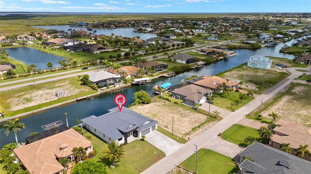 Front exterior of a new home in , Cape Coral, FL, highlighting curb appeal (Image 1). Front exterior of a new home in , Cape Coral, FL, highlighting curb appeal (Image 1).