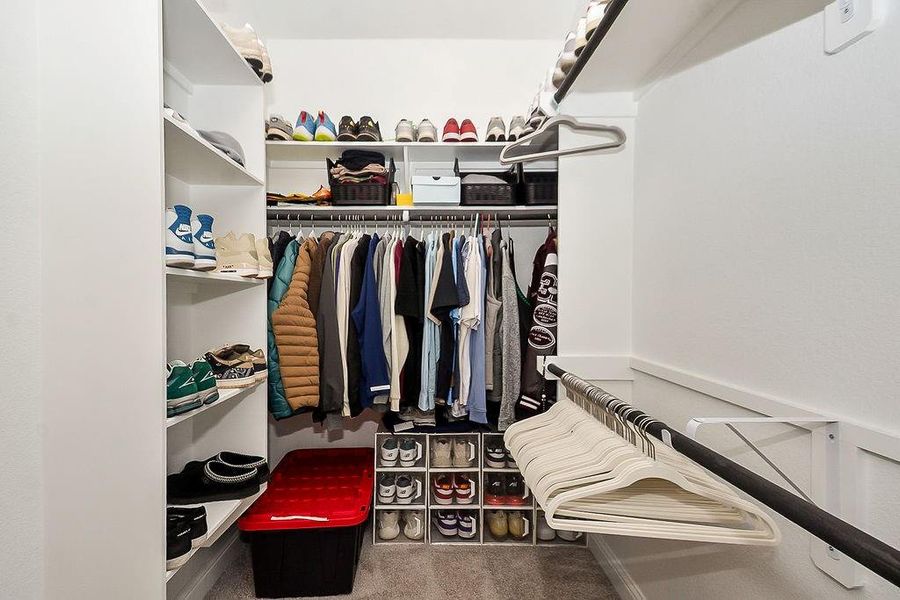 Large walk-in primary closet Large walk-in primary closet