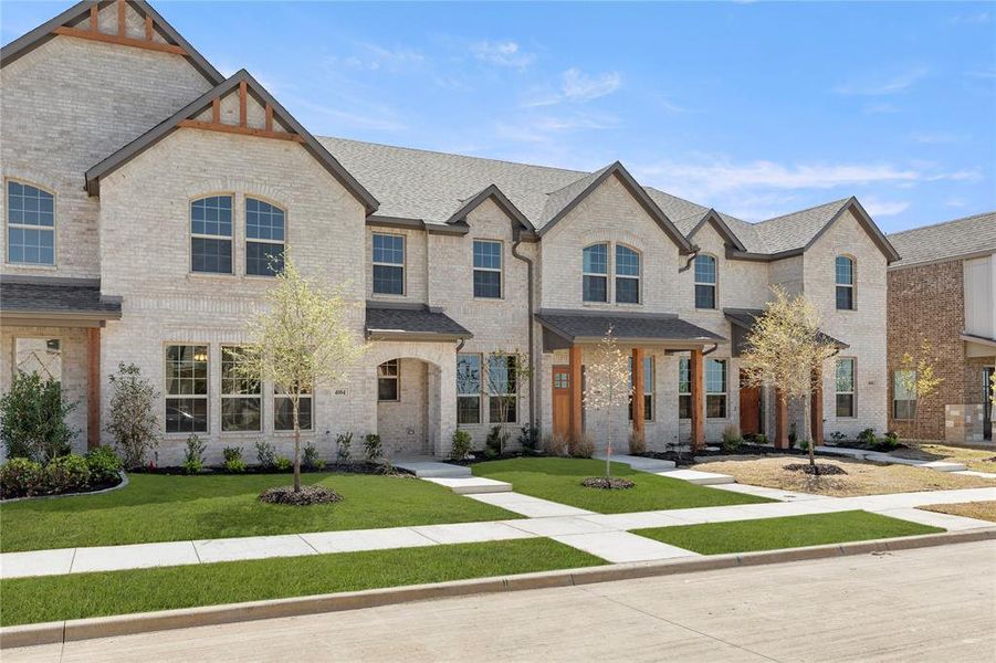 Front exterior of a new home in Sanger Circle, Sanger, TX, highlighting curb appeal (Image 16). Front exterior of a new home in Sanger Circle, Sanger, TX, highlighting curb appeal (Image 16).
