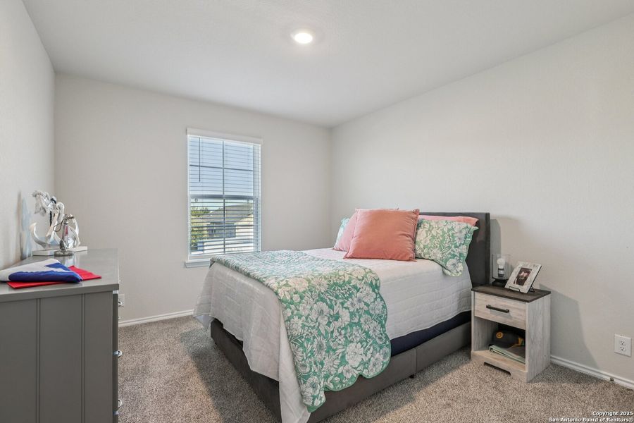 Furnished interior view inside a new home in The Links at River Bend, Floresville (Image 28). Furnished interior view inside a new home in The Links at River Bend, Floresville (Image 28).