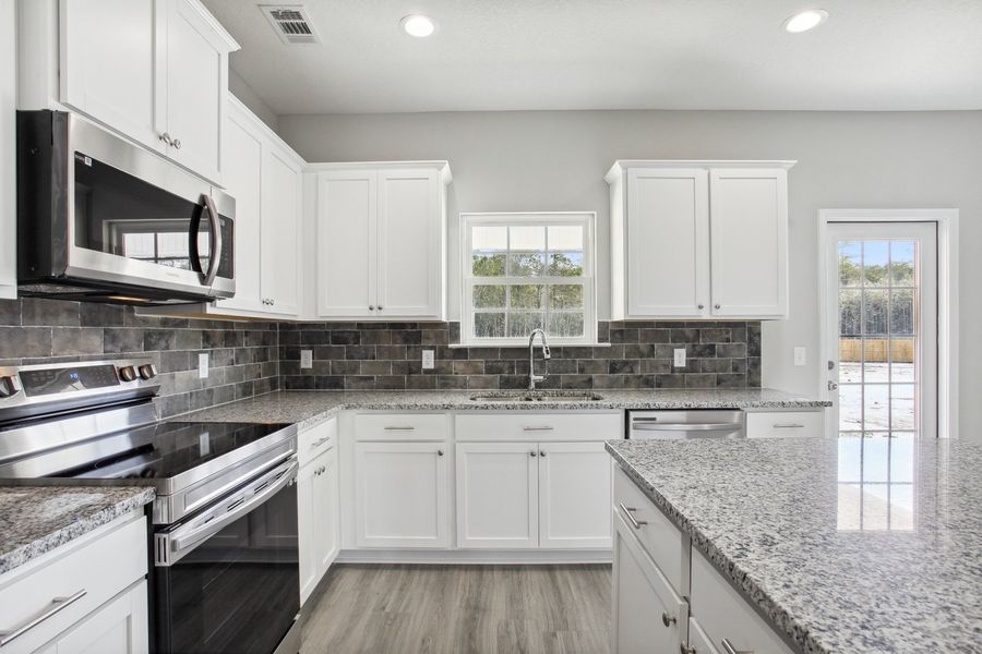 Representative furnished interior of a home built from the The Arcadia by RTS Homes in Doctor's Creek, Ludowici (Image 9).