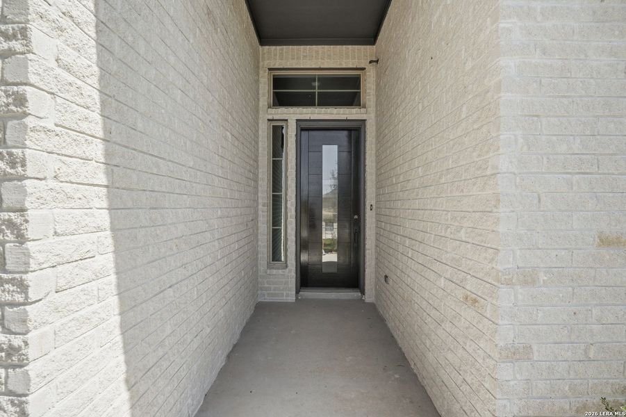 Exterior details and patio area of a home in Alsatian Oaks, Castroville (Image 3).