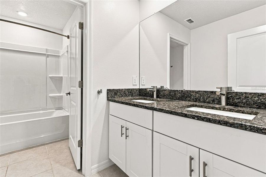 Furnished interior view inside a new home in The Isle of Avalon, Spring Hill (Image 10).