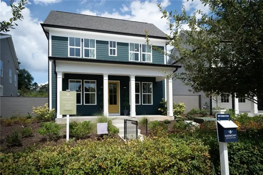 Front exterior of a new home in Harmony, Auburn, GA, highlighting curb appeal (Image 1). Front exterior of a new home in Harmony, Auburn, GA, highlighting curb appeal (Image 1).